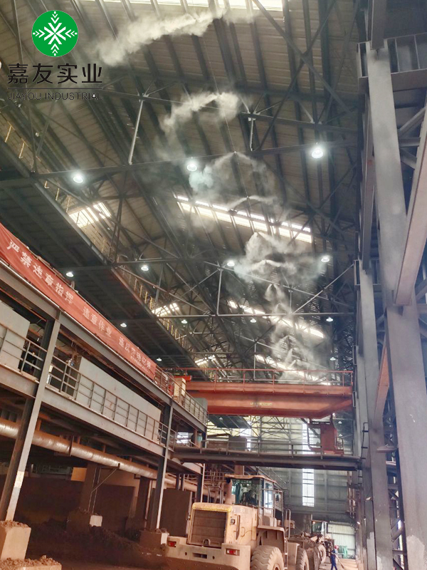 料棚降尘新技术_极悦注册喷雾降尘系统应用恒鑫通矿业料棚案例